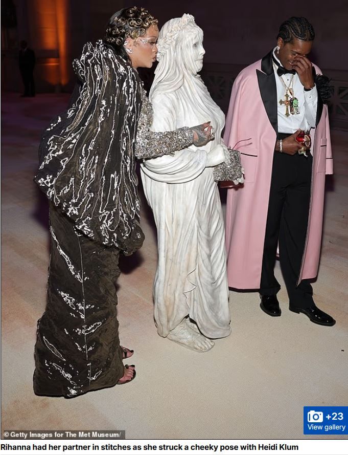 Rihanna touching Heidi's nipple