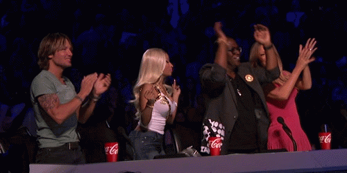 Here you see 3 judges clapping with their hands, and Niki Minaj with her ass