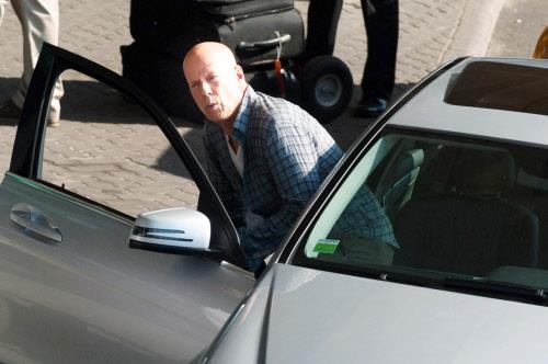 Bruce Willis is suing Apple. Karma, thou art promiscuous