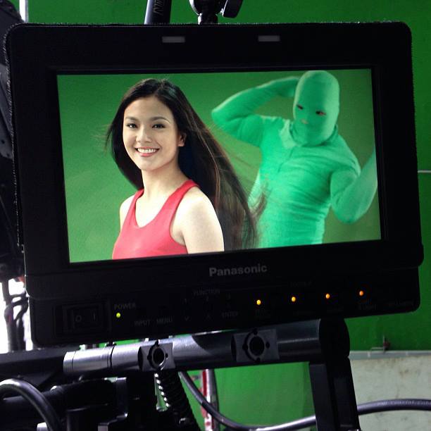 Green ninjas help shampoo commercial actresses do their hair swing