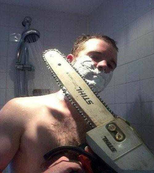 Overly manly man shaving.