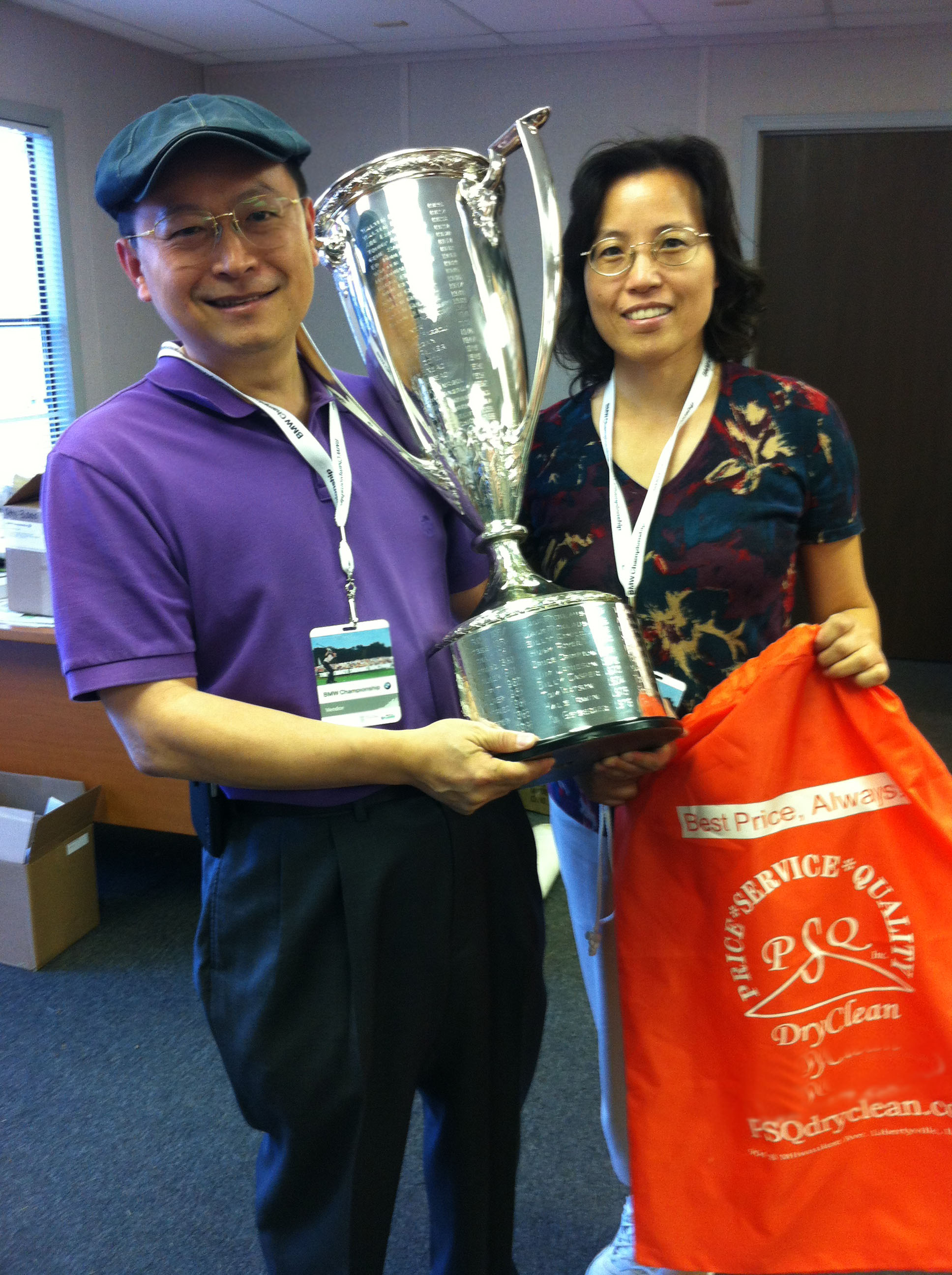 My parents got a picture with the BMW Golf Championship Cup