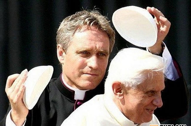 For a dollar guess which hat the pope is under