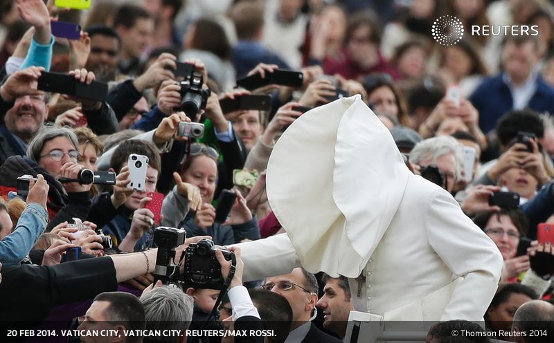 "Frightened by the large crowd, The Pope expands its frilled neck skin to ward off any Atheists"