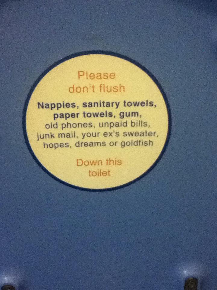 I'd like to know the story behind the local train service's bathroom stickers.