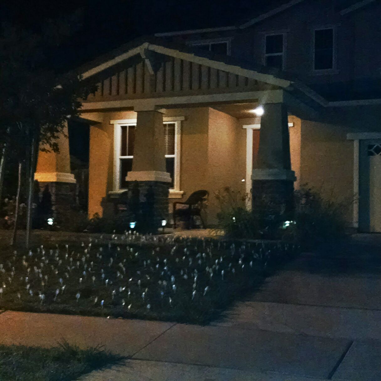 Hundreds of Spoons.......hundreds....stuck in this mans lawn.