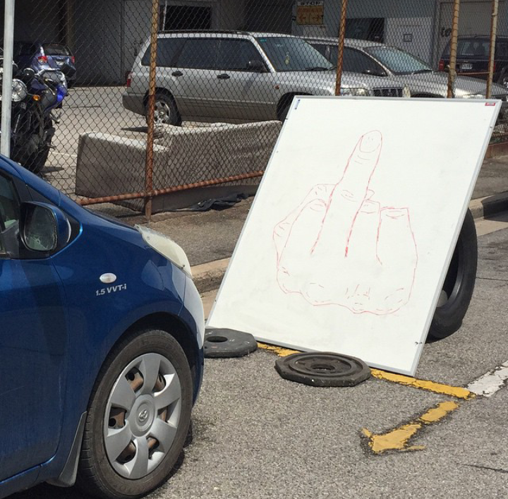 The blue car parked in someone's driveway, they clearly weren't impressed.