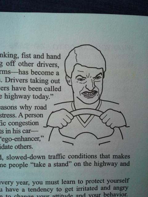 Road rage man in driver's ed book