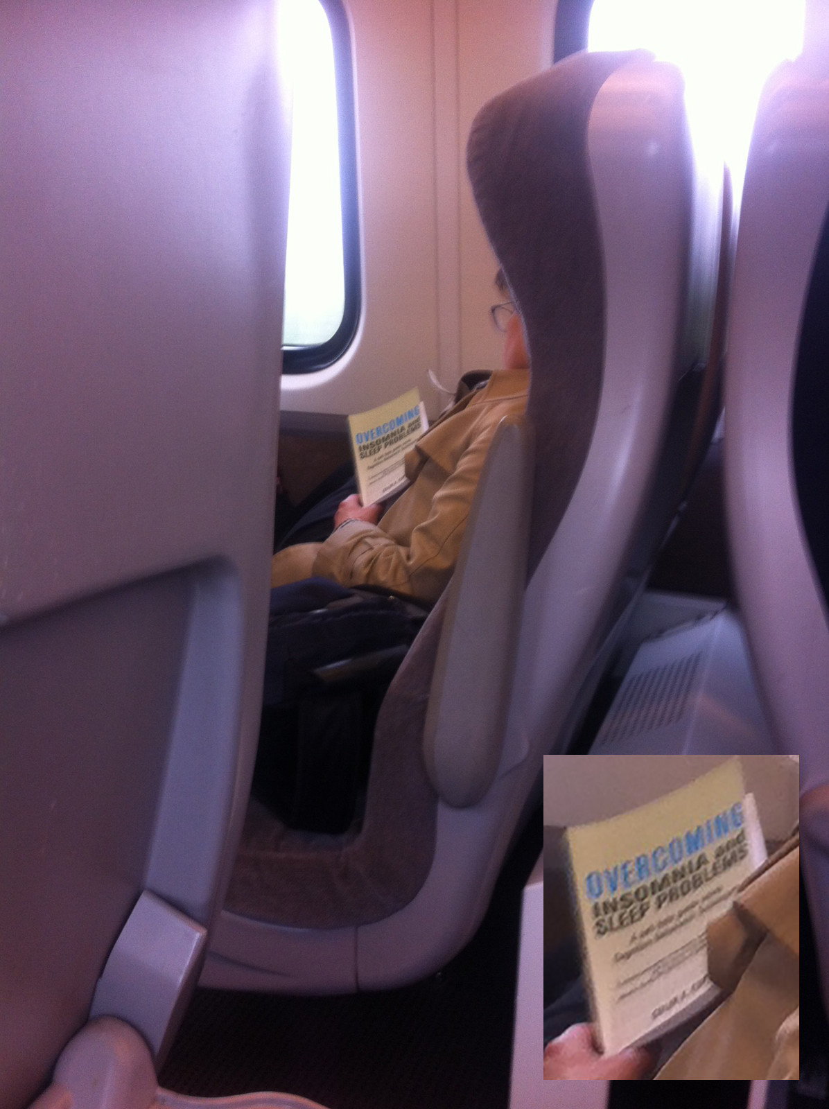 Woman asleep on train