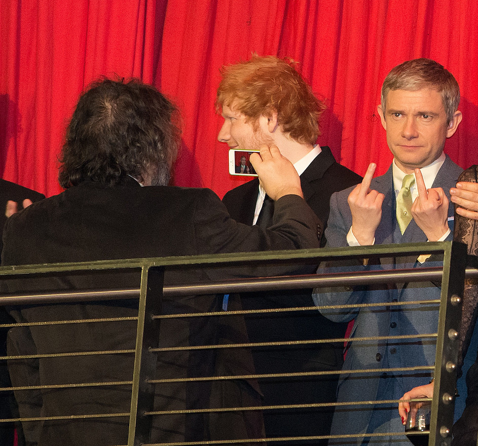 Director Peter Jackson takes a photo of Martin Freeman at "The Hobbit" premiere
