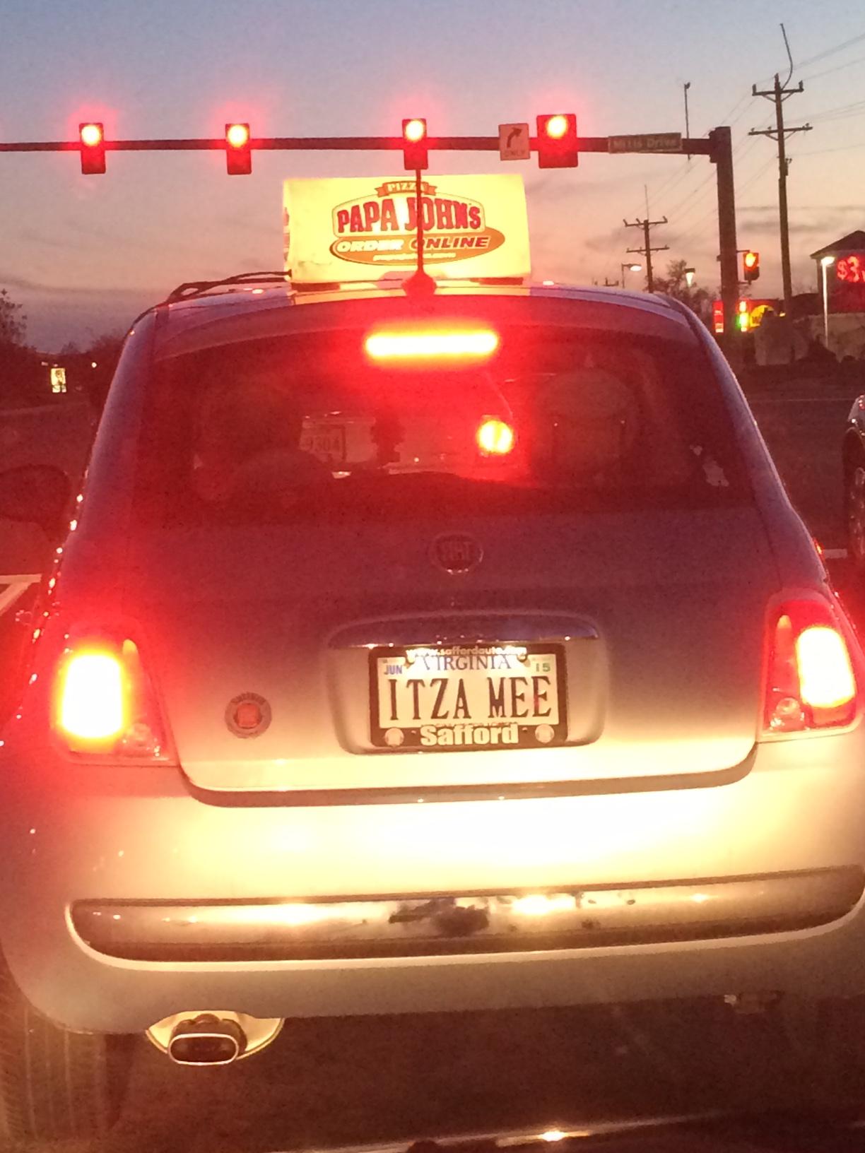 This pizza delivery driver was in front of me at a red light the other night.