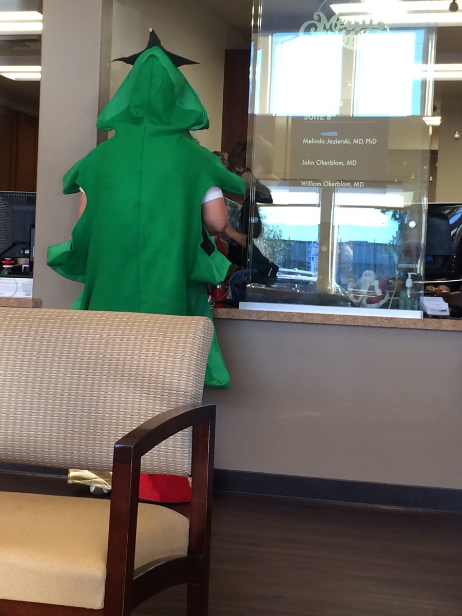 At the doctors office. Apparently Christmas trees get sick too.