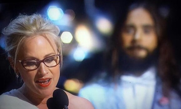 Rare photo of Jesus blessing Patricia Arquette during her acceptance speech.