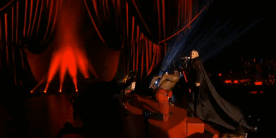Madonna pulled down stairs at BRIT awards.