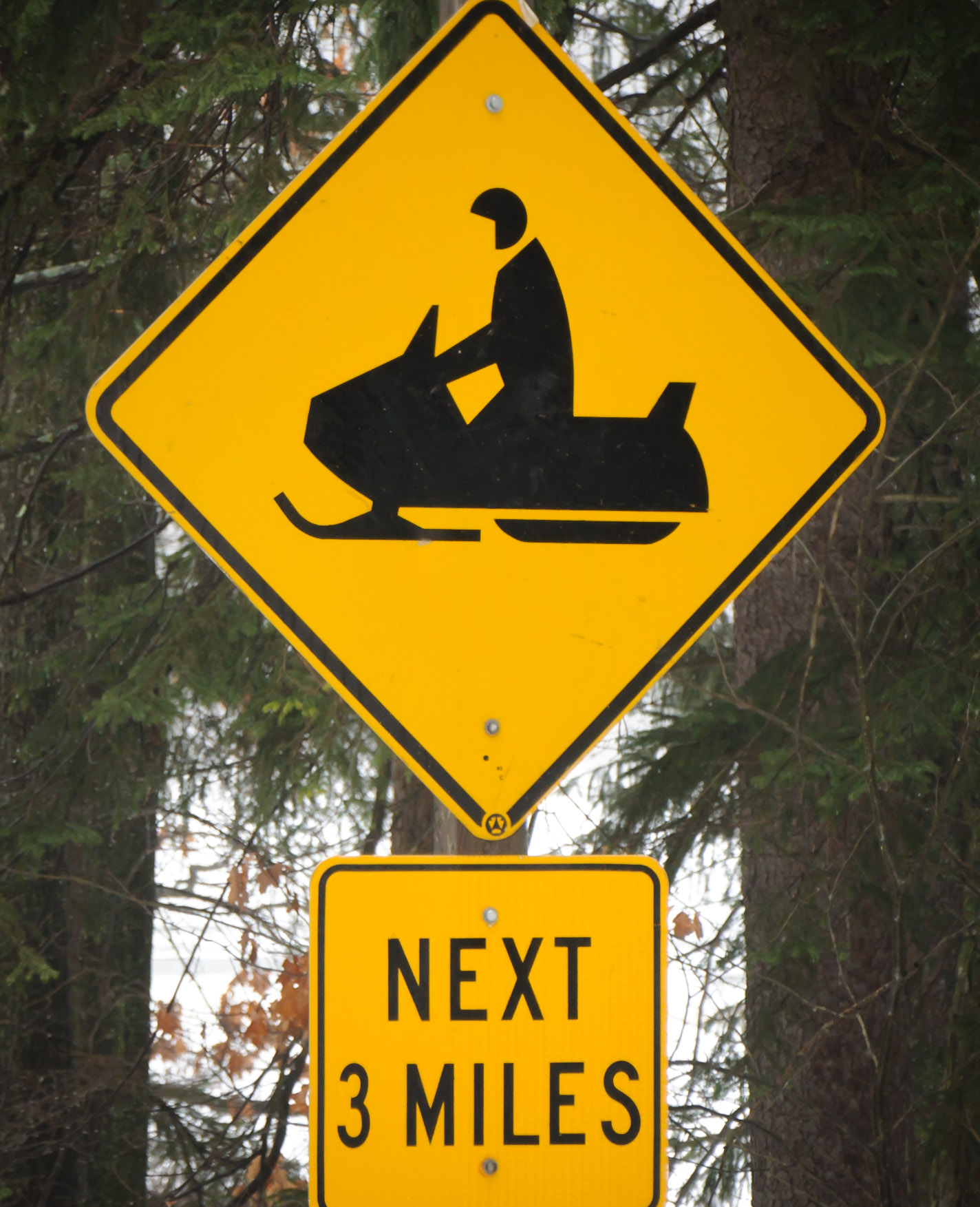 Caution! Pac-Man driving snowmobile next 3 miles.