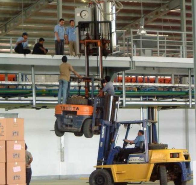 This guy is so rich, he has a forklift on his forklift