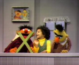 Ernie distracts the kid while bert checks out his ***