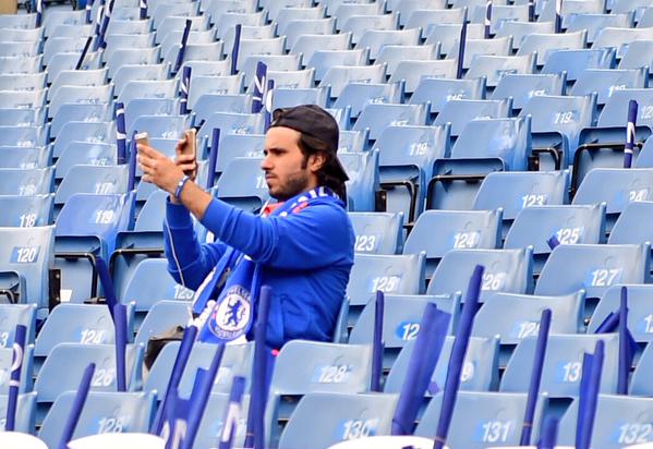 Chelsea fan taking a selfie of himself taking a selfie.