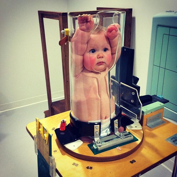 A baby getting an X-Ray looks hilarious.