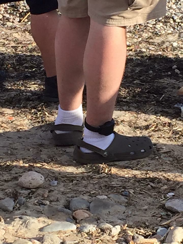 The holy trinity, socks, Crocs, and ankle monitor.