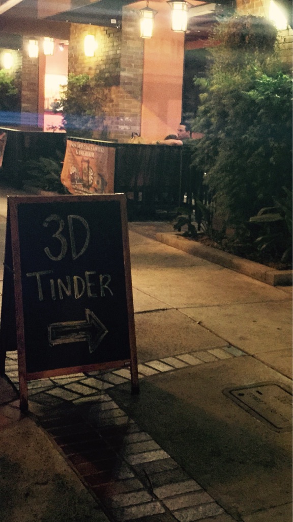 This sign, outside of a bar.