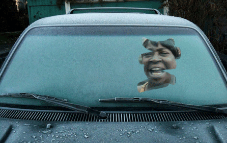Scraping the windshield before going to work