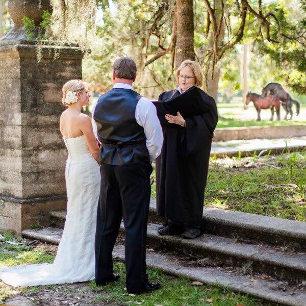 The wedding photographer captured a beautiful moment during the ceremony.