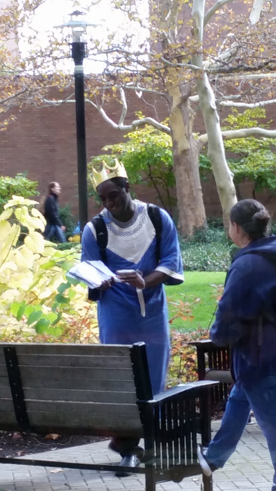 This guy is walking around campus asking for people's emails so he can send them money