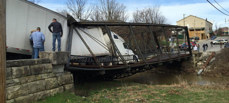 Trucker destroys historic bridge because she didn't know how many pounds 6 tons was.