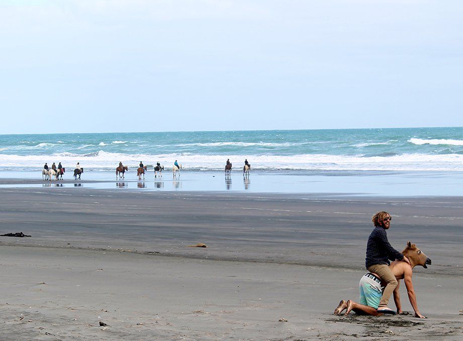a romantic horseback ride on the beach