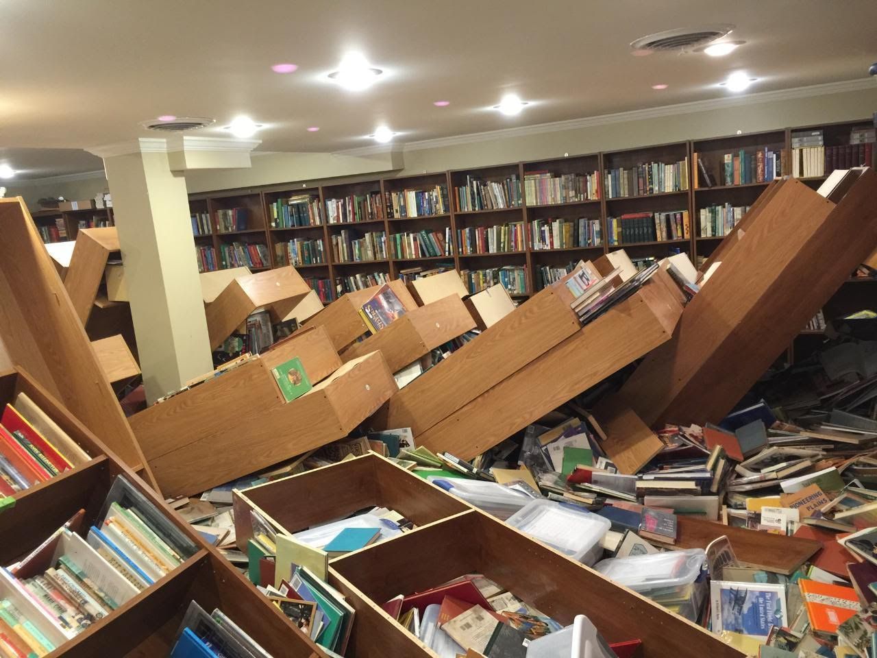 Friend has a library, her 9 year old pushed over all the shelves last night. 10,000 books in floor.