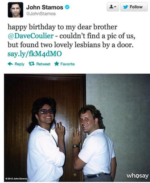 Two lesbians by a door