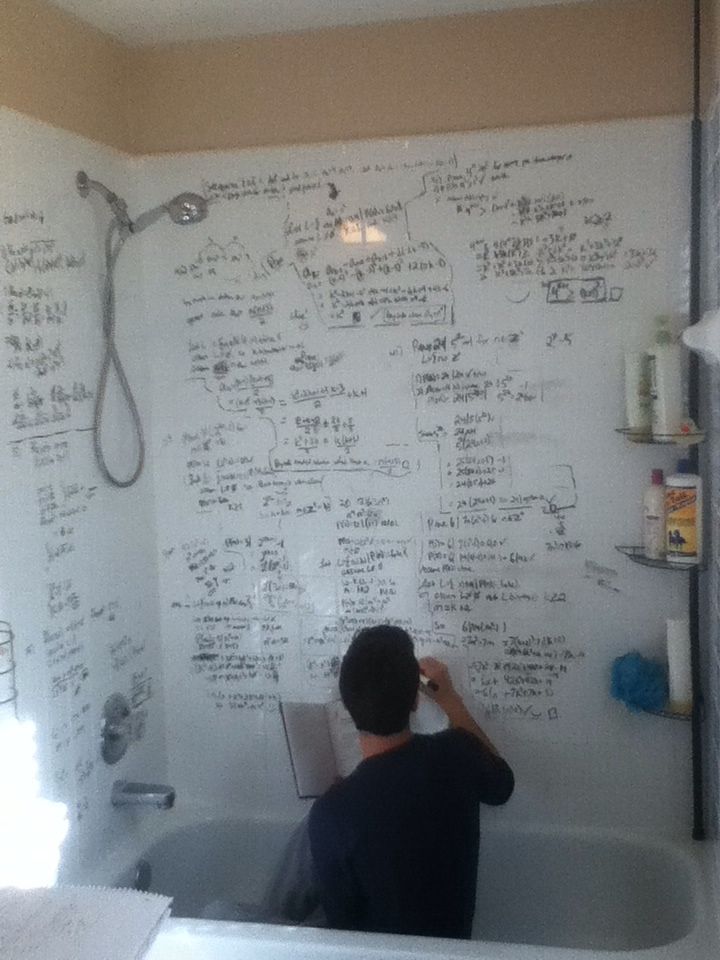 Friend needed a white board to write proofs; this is the true purpose of showers