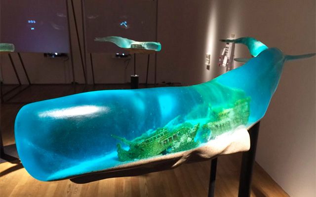 Deep Ocean Scenes Encapsulated in Translucent Whale Sculpture