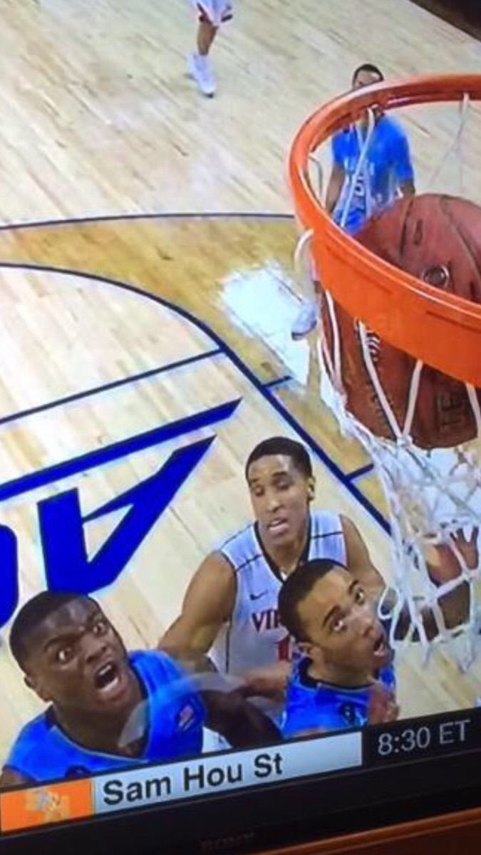 UNC player Joel James tips ball into his own basket