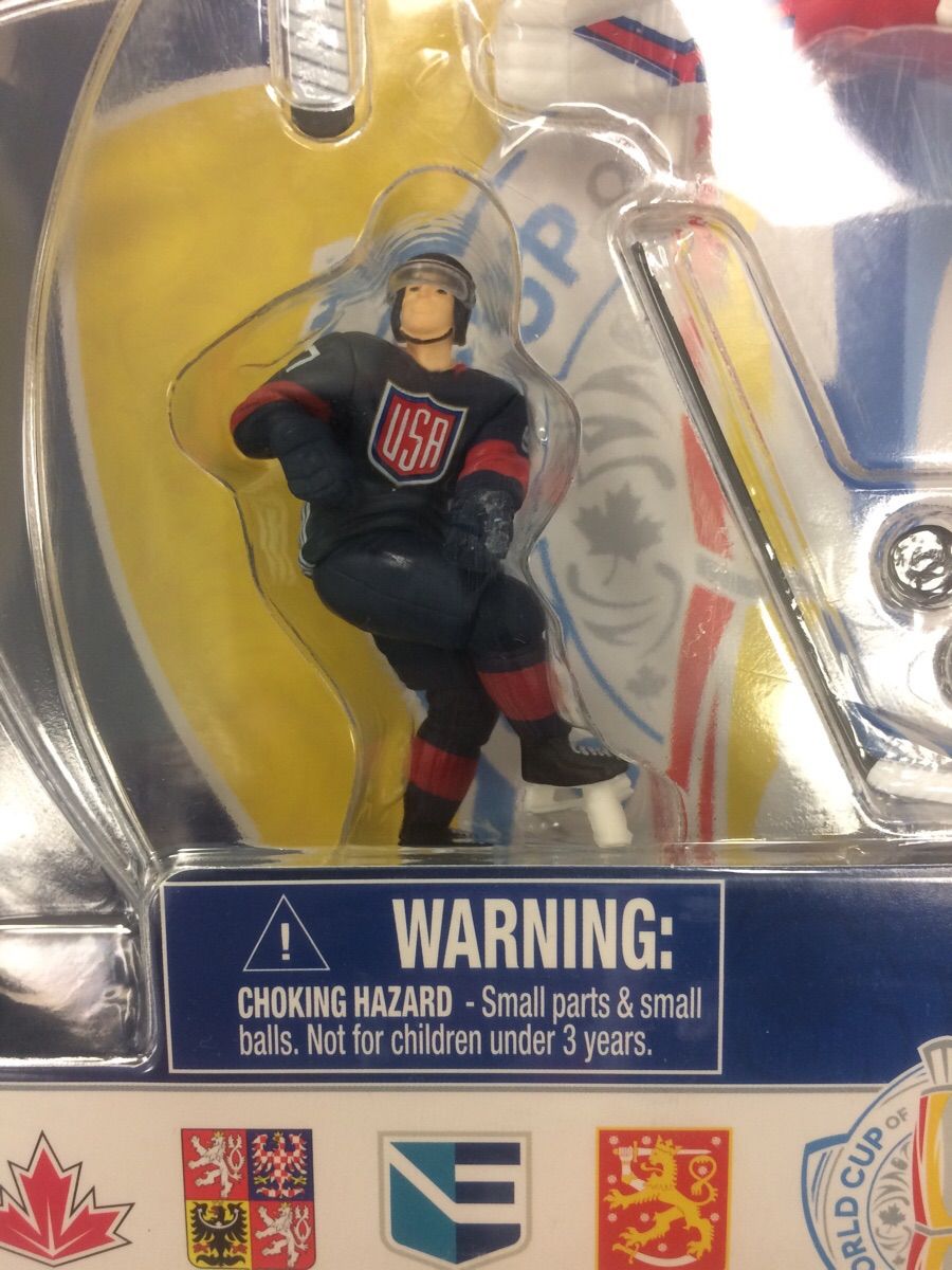 World Cup action figure has accurate warning label.