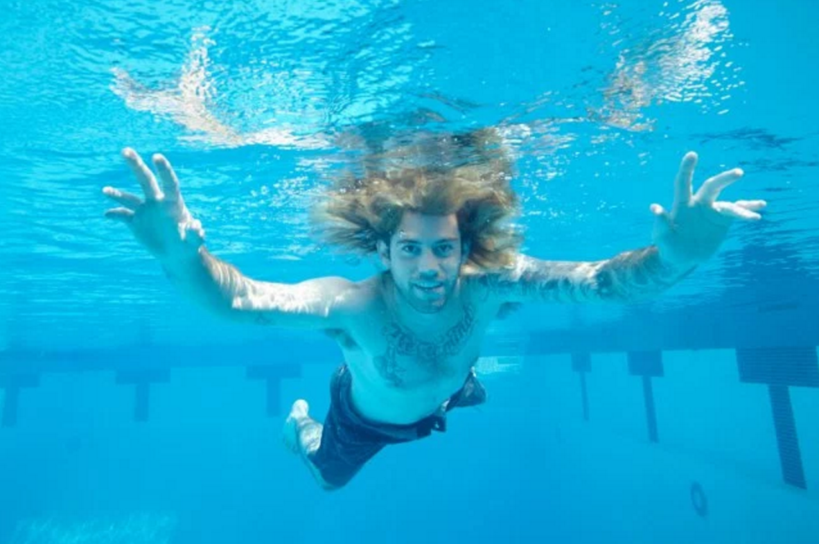 PsBattle: Baby from Nirvana’s Nevermind recreates album cover for 25th anniversary