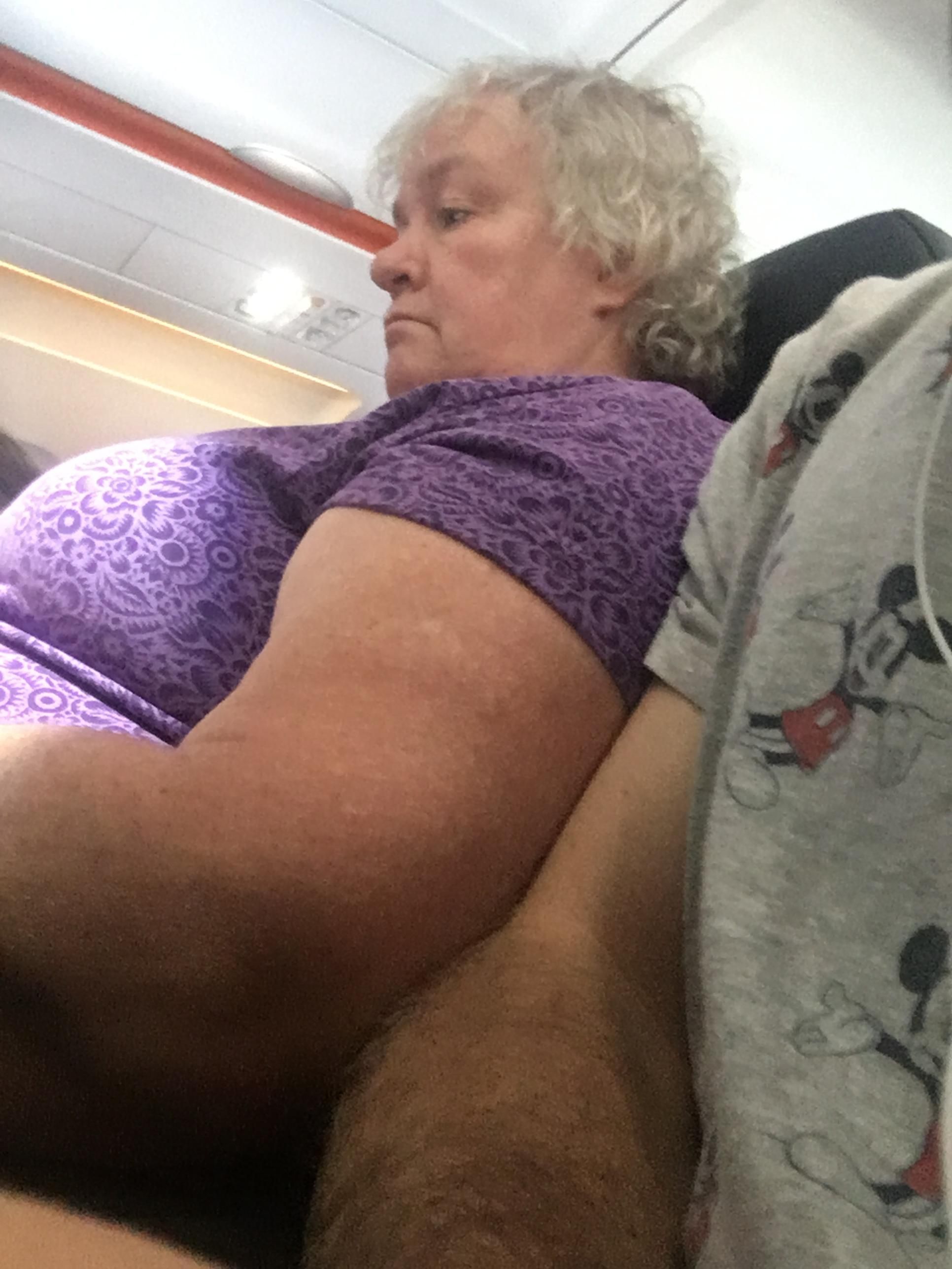 When asked if she could try to keep to her own seat, she suggested I scoot closer to my wife, since we had 'so much more space than her'.