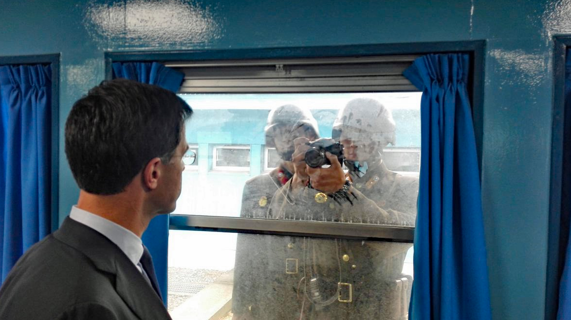 PsBattle: Dutch prime minister Mark Rutte being watched by North Korean soldiers in Panmunjom