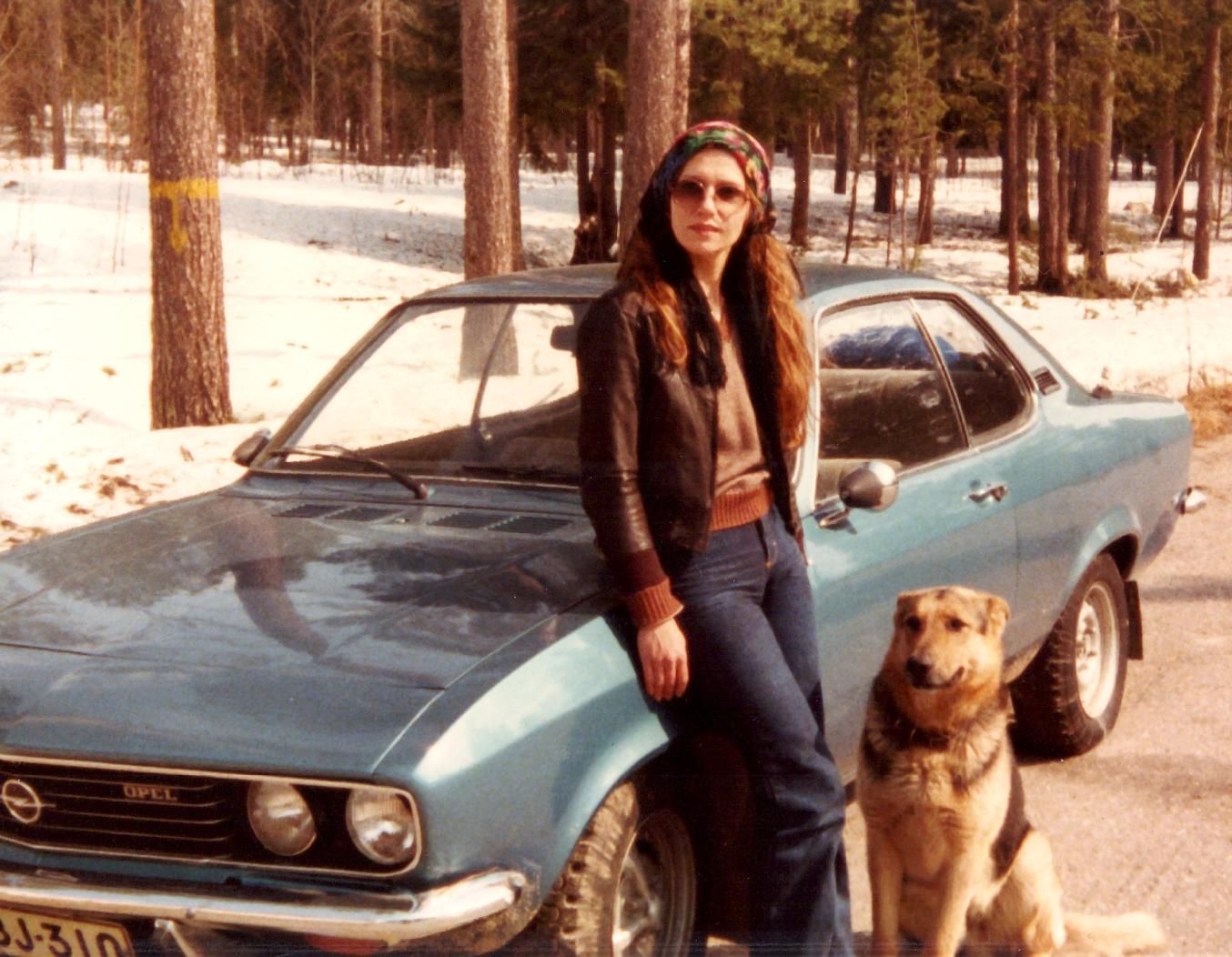 My dear Mom in the 70s with her German Shepard and Manta.