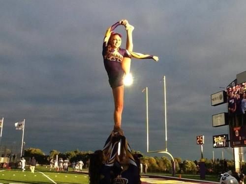 This cheerleader thinks the sun shines out of her ass