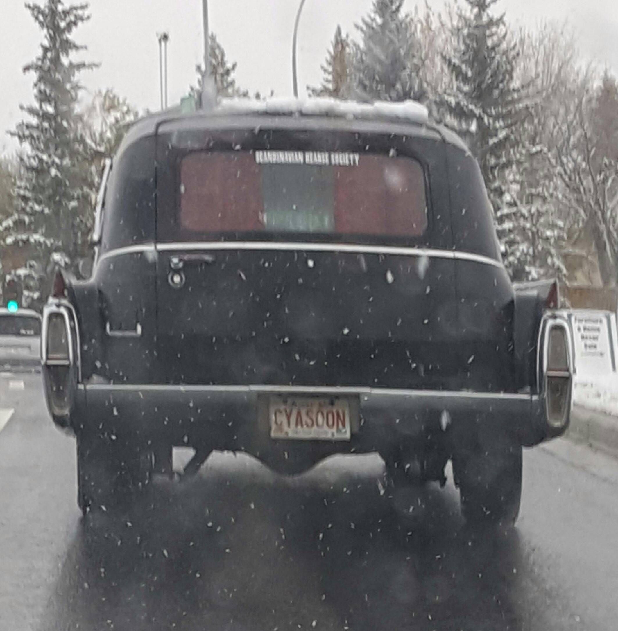 I was driving behind a hearse today with a chillingly appropriate license plate.