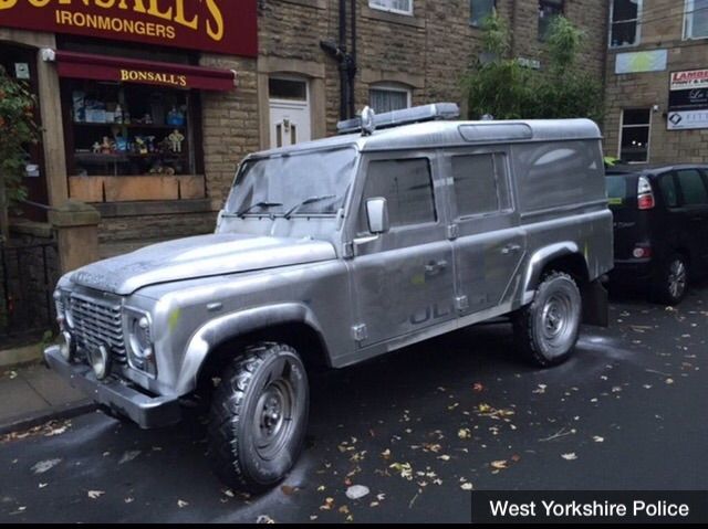 A police Land Rover has been spray-painted silver by vandals in Leeds