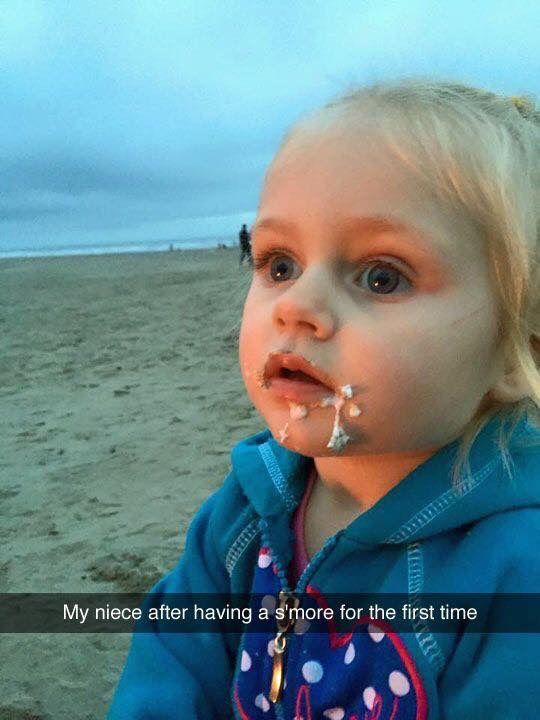 My niece after trying a s'more for the first time.