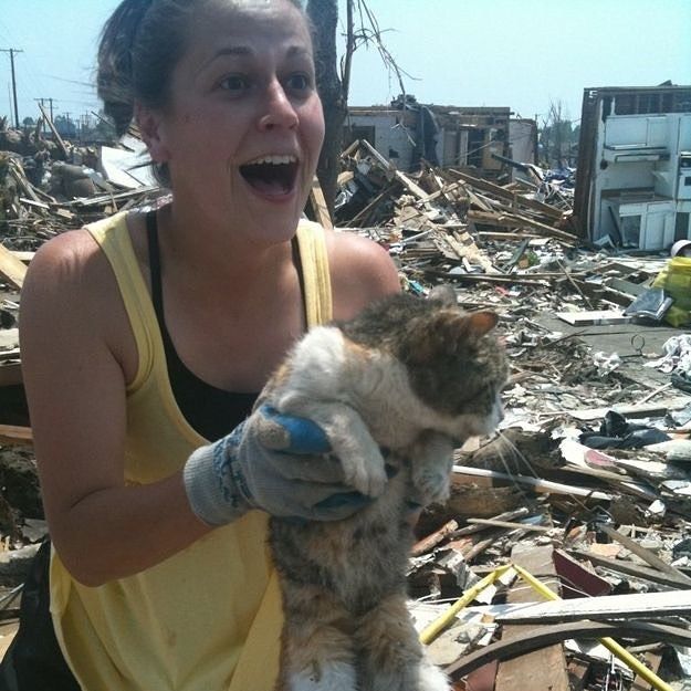 Pure joy after an earthquake...finding her cat safe!!!
