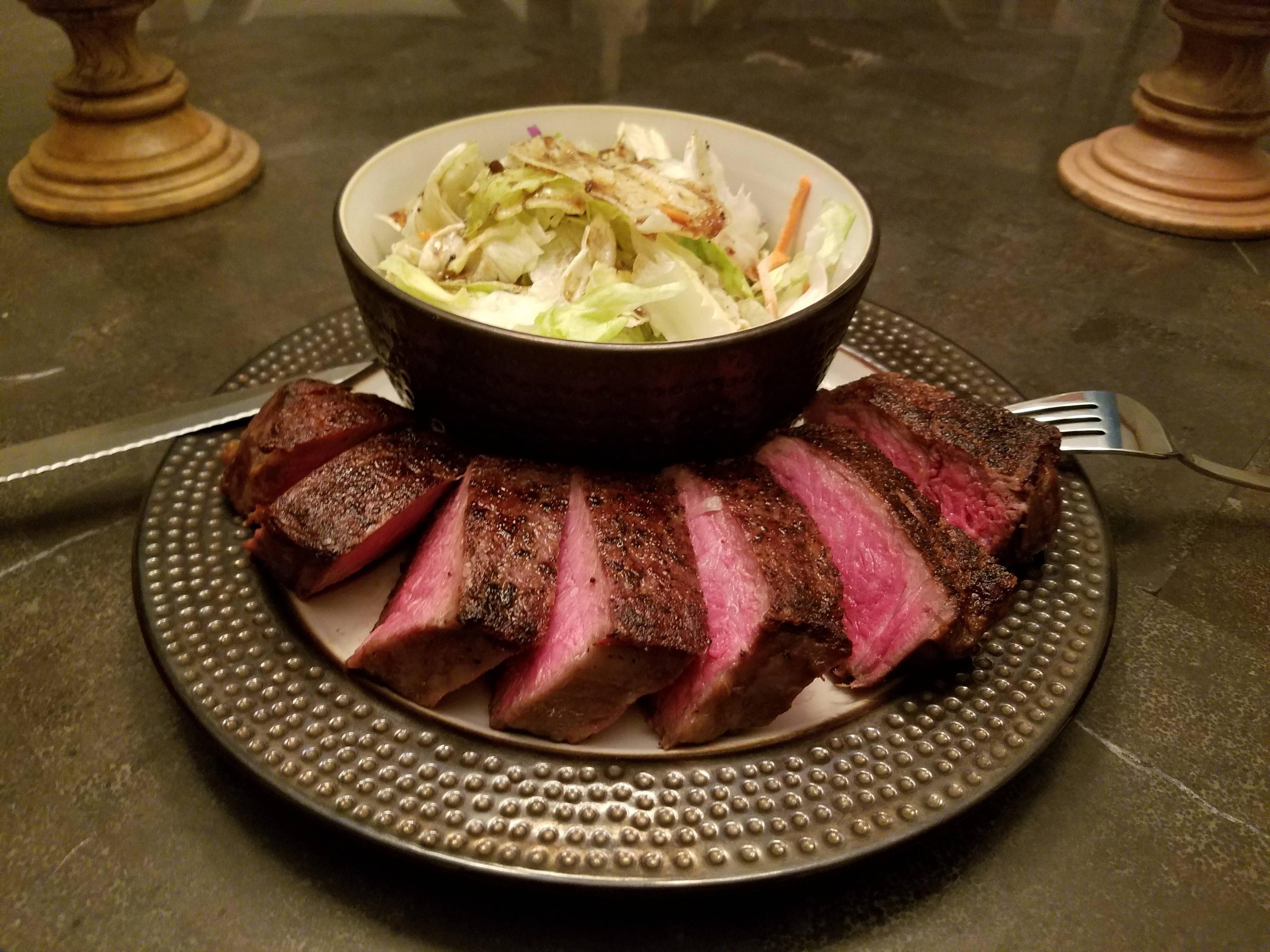 New York Strip steak and salad.