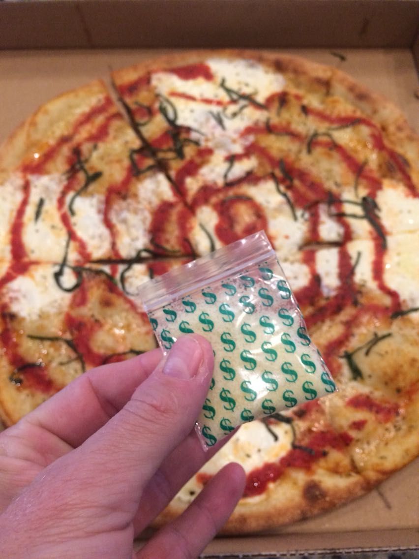 The parmesan cheese with my pizza came in a coke baggie.