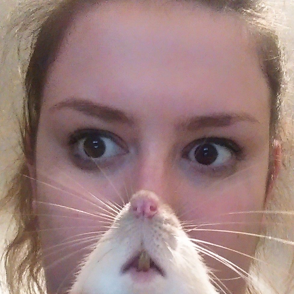 I was photobombed by a rat.... I am now... Rat Woman.