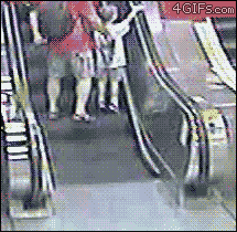 Grandma trying to ride a escalator with her wheelchair