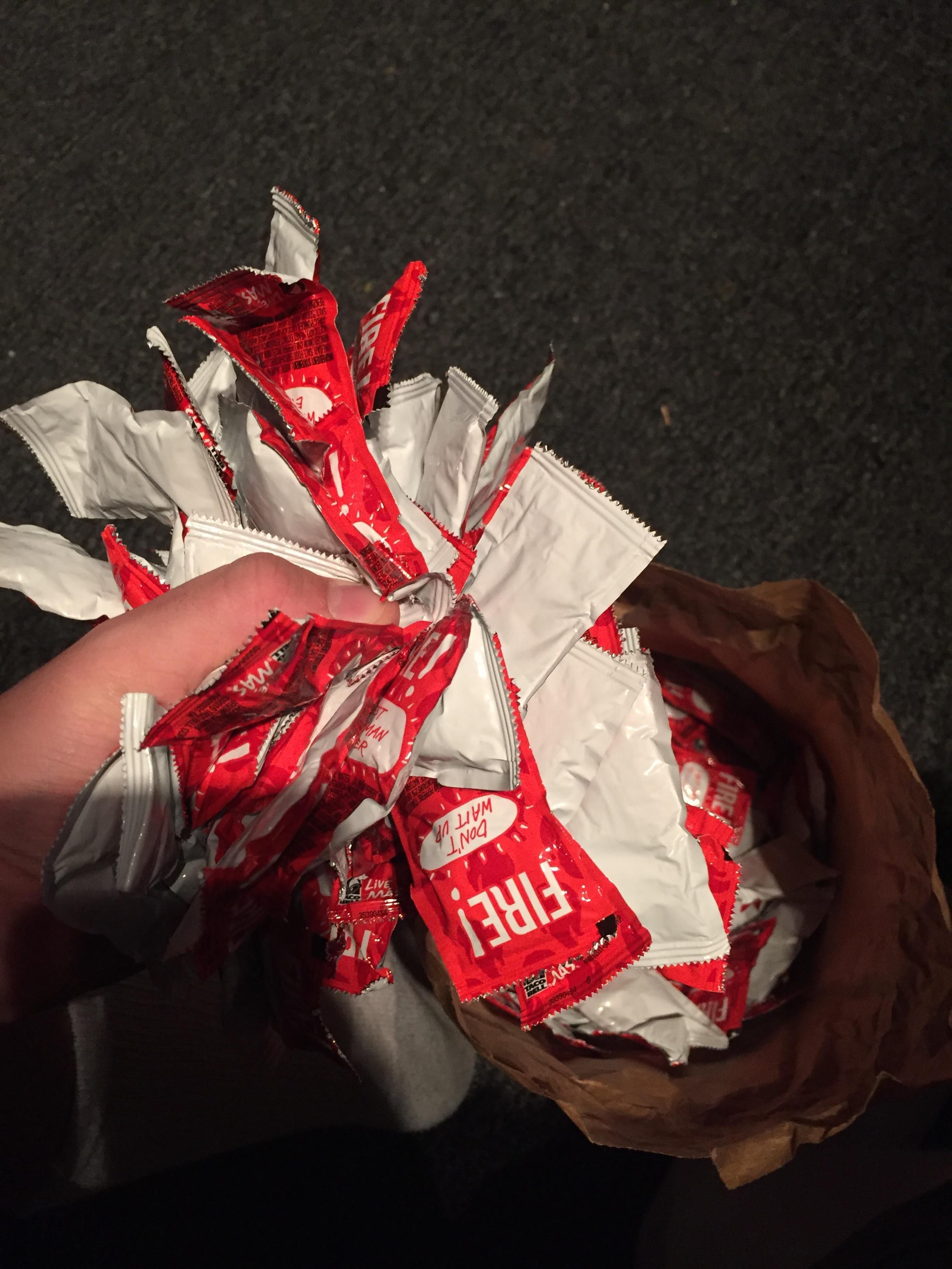 Went to Taco Bell drunk. Asked for a "shit ton" of fire sauce. They gave me a ***ing bag full. I'm so happy.